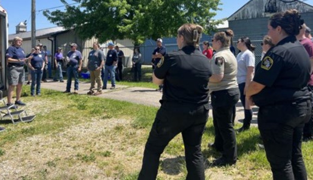 Instructors train first responders in an outdoor setting.jpg